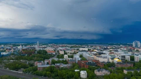 Hyperlapse drone shot of lightning and thunder clouds rolling over Helsinki Stock Footage 337267536