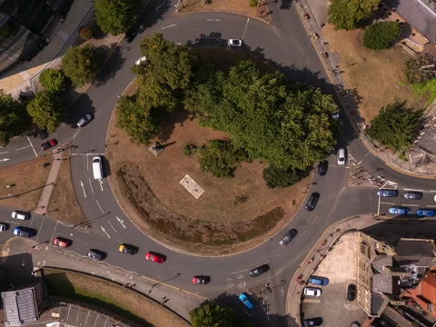 Hyperlapse drone shot moving past Chester racecourse toward roundabout Stock Footage 315664306