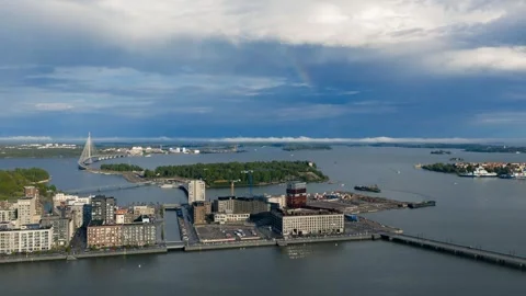 Hyperlapse drone shot of a rainbow above the Helsinki archipelago, sunny day Stock Footage 337143979