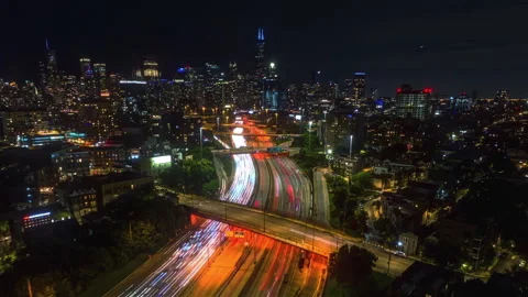Hyperlapse drone shot of traffic on the 90 94 Interchange, night in River Stock Footage 247625390