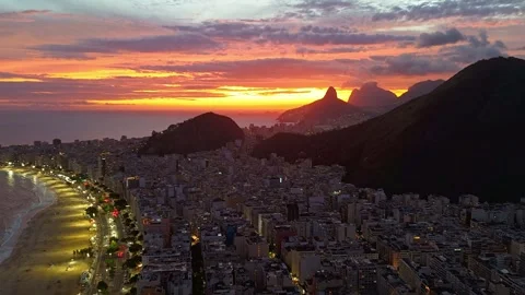 Hyperlapse drone view of Copacabana at sunset with coastal traffic, Rio Video stock 328023304