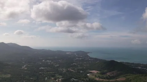 Hyperlapse drone views of Koh Samui tropical coast, sweeping clouds over sea and Stock Footage 319457561