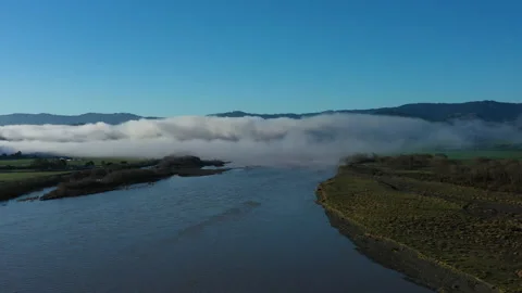 Hyperlapse Eel River California Landscape Aerial Drone Over Water into Clouds 4K Stock Footage 145181622