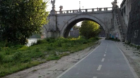 Hyperlapse, fast motion on the bicycle lane near the Tiber river in Rome, dusk Stock Footage 108503909