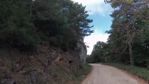 Hyperlapse forward mountain road blue sky Stock Footage 123358187