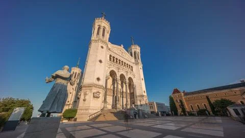Hyperlapse front view of the Basilica of Notre Dame de Fourviere during sun.. Stock Photos