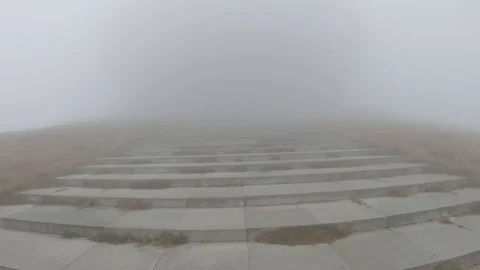 Hyperlapse going up stairs to a alien ufo shape building 4k Stock Footage 123407423