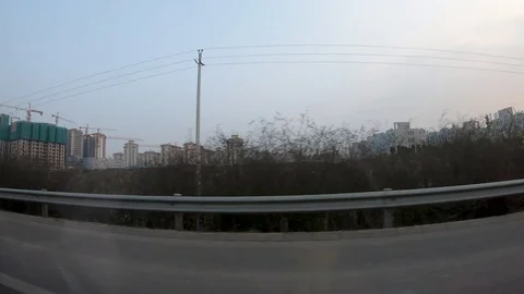 Hyperlapse of Kunming City during car moving view from inside car windows 스톡 동영상 104883891