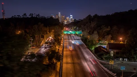 Hyperlapse of Los Angeles Citscape at night. Traffic driving into city 스톡 동영상 87537704