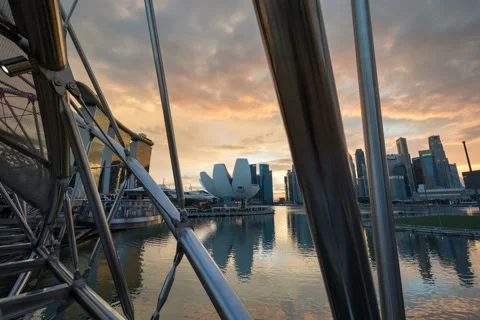 Hyperlapse move sunset singapore helix bridge people city skyline Stock Footage 162948070