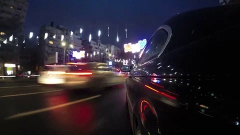 Hyperlapse from a moving car on a street at night with christmas lights Stock Footage 85037652