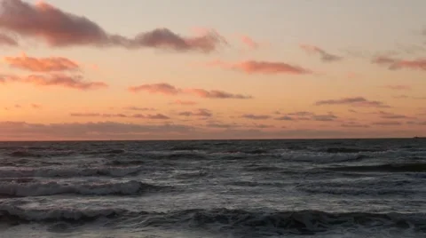 Hyperlapse of moving clouds under the open sea in sunset time Stock Footage 62209698