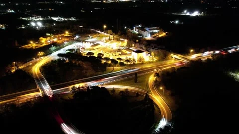 Hyperlapse Night Aerial drone view of Italy highway motorway exit Arezzo Tuscany Stock Footage 166532708