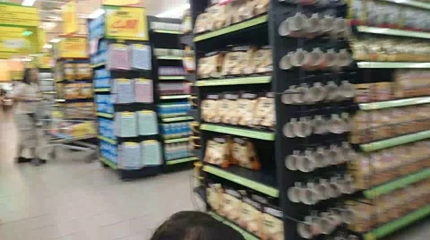 Hyperlapse or motion time lapse of trolley cart in supermarket Stock Footage 41393464