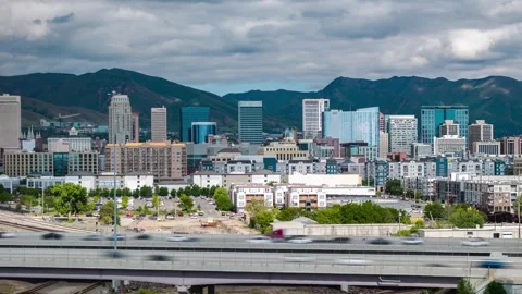 Hyperlapse over Freeway traffic and Salt Lake City Downtown Buildings on a Stock Footage 337907356