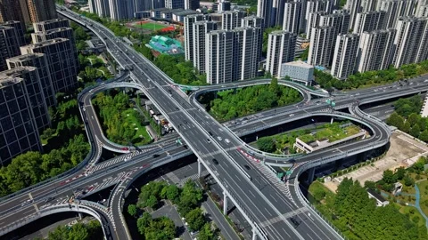 Hyperlapse over highway interchange and cityscape during the day. Hangzhou Stock-Footage 314832400