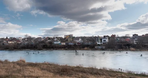Hyperlapse over lake with winter fishers in 4K Stock Footage 124583377