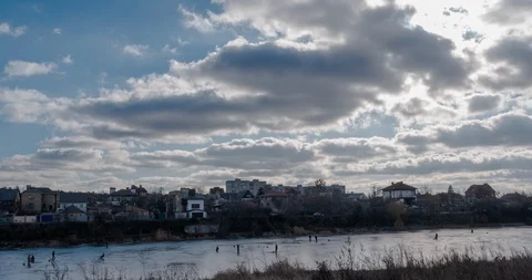 Hyperlapse over lake with winter fishers in 4K Stock Footage 124584001