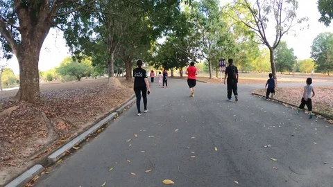 Hyperlapse of people jogging on park Stock Footage 106869507