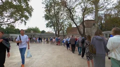 Hyperlapse of people queue at entrance to Sultanahmet mosque Stock Footage 295873356