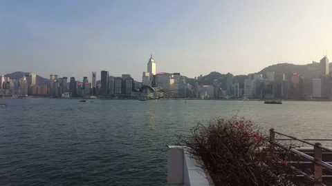 Hyperlapse of people walking in Tsim Sha Tsui water front at sunny day Video stock 142335784