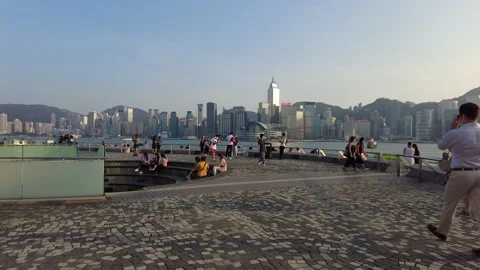 Hyperlapse of people walking in Tsim Sha Tsui water front at sunny day Video stock 142335794