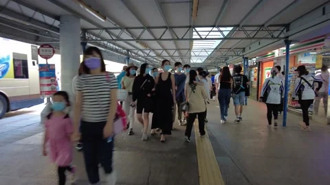 Hyperlapse of people walking in Tsim Sha Tsui water front at sunny day Video stock 142335800
