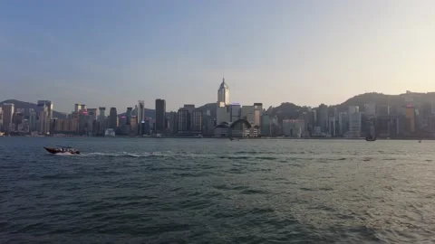 Hyperlapse of people walking in Tsim Sha Tsui water front at sunny day Stock Footage 142335828