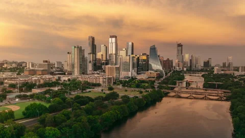 Hyperlapse Pulls Away From Downtown Austin Skyline at Sunset During Busy Rush Stock Footage 313021039
