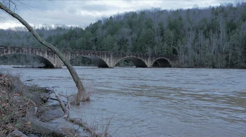 Hyperlapse of Raging Flood Waters under Bridge Cumberland River Stock Footage 61096614