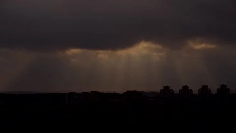 Hyperlapse the rays of the sun quickly pass through the clouds before sunset Stock Footage 221482212