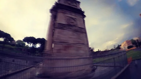 Hyperlapse Rome, Arch of Constantine and Colosseum rainy sunset, orbit 360 view Stock Footage 106433020