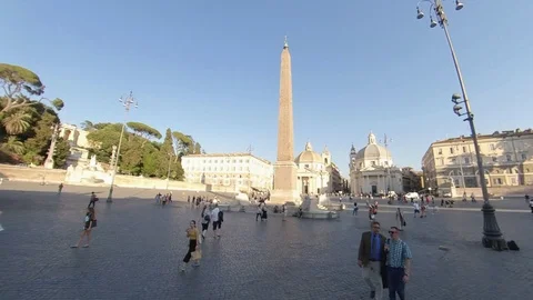 Hyperlapse, Rome, Piazza del Popolo, around the obelisk by bike at sunset Stock Footage 112876065