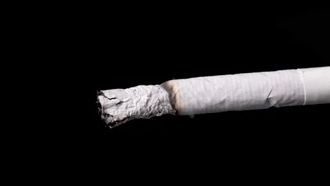 Hyperlapse shot of smoking cigarette isolated on black background. Stock Footage 147075446