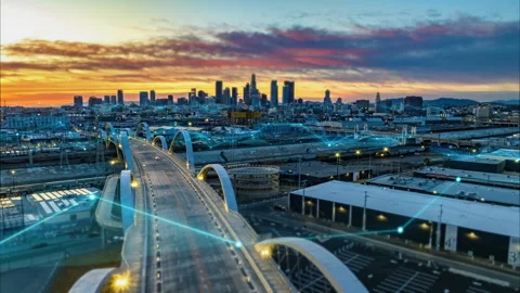 Hyperlapse shot of urban borough and modern road bridge over river against 스톡 동영상 242579382