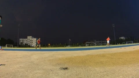 Hyperlapse style man and woman asian running workout on the track or exercise Stock Footage 101787366
