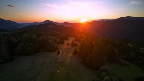 Hyperlapse of a summer sunset over a mountain landscape from an aerial view Stock Footage 316143521