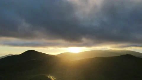 Hyperlapse sun between clouds and mountain Stock Footage 146545244