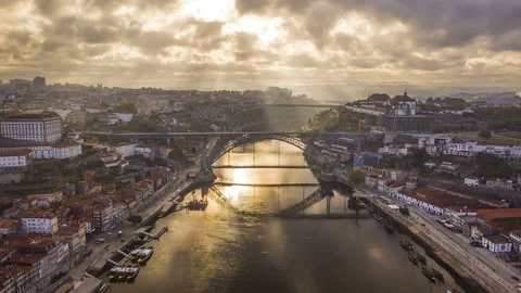 [Hyperlapse] Sunrise over Dauro river in Porto, Portugal 4k aerial drone skyline Stock Footage 111685581