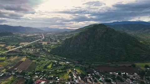 Hyperlapse sunset above the Central Valleys of Oaxaca beneath dramatic clouds Stock Footage 340599440