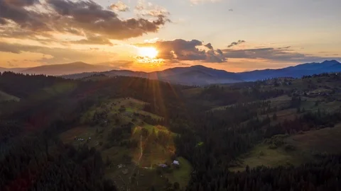 Hyperlapse of sunset in the summer mountains with a beautiful sky. Drone video Stock Footage 119390005