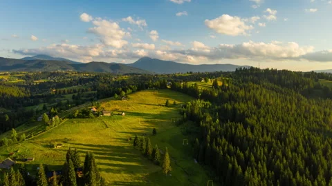Hyperlapse of sunset in the summer mountains with a beautiful sky. Aerial view Stock Footage 167890379