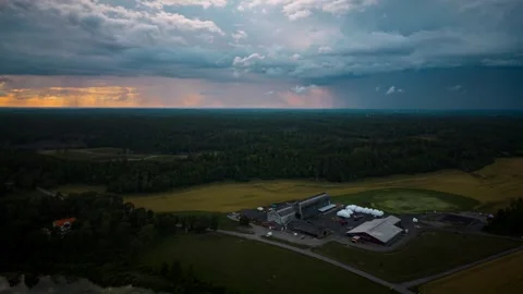 Hyperlapse sunset summer rain over swedish agricultural landscape Stock Footage 247047310