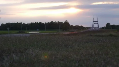 Hyperlapse of sunset with suspension bridge Stock Footage
