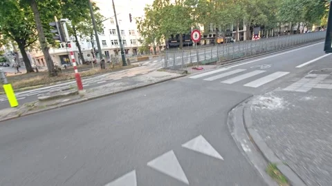 Hyperlapse Through Sunny Residential Brussels Street With Parked Cars and Long 스톡 동영상 345010157