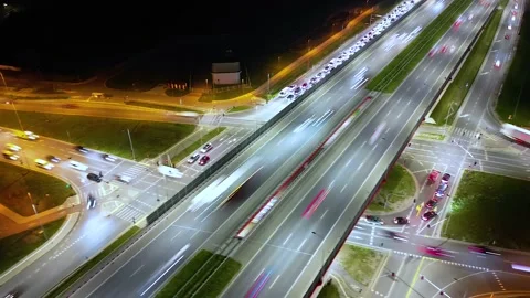 Hyperlapse time-lapse of car traffic transportation above circle roundabout.. Stock Footage 224476849