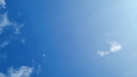 Hyperlapse time lapse video. White fluffy clouds floating in clear blue sky Stock Footage 251057827