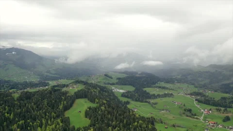 Hyperlapse Timelapse Drone shot with dense cloud cover mountains and trees Stock-Footage 138649032
