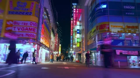 Hyperlapse of Tokyo Akihabara district, fast moving pedestrians in busy night Stock Footage 224498684