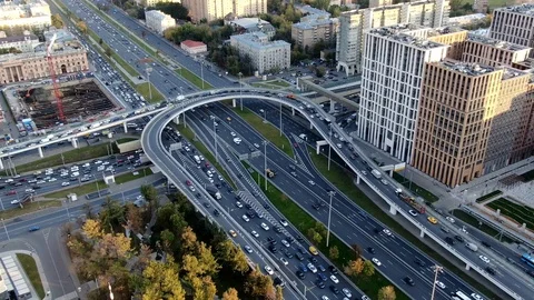 Hyperlapse traffic along multilevel junction in the city center from the height Stock Footage 116676445